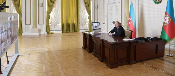 Ильхам Алиев во время видеоконференции, фото из архива - Sputnik Азербайджан