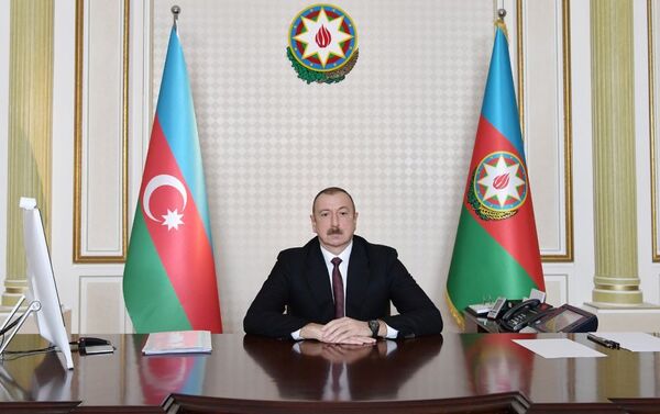 Ильхам Алиев во время видеоконференции - Sputnik Азербайджан