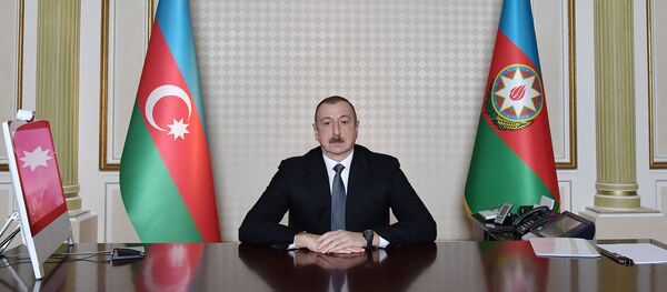 Ильхам Алиев провел совещание в формате видеосвязи с участием министров труда и социальной защиты населения и экономики Ильхам Алиев провел совещание в формате видеосвязи с участием министров труда и социальной защиты населения и экономики - Sputnik Азербайджан
