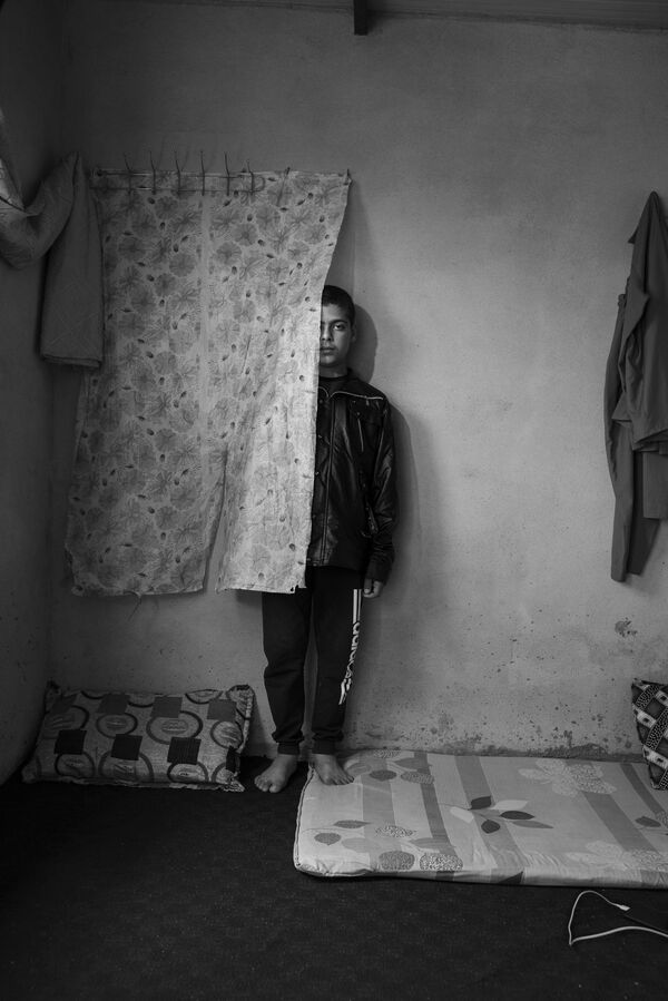 Один из снимков репортажа The Haunted фотографа Adam Ferguson, победившего в конкурсе World Press Photo 2020 в категории Portraits - Sputnik Azərbaycan