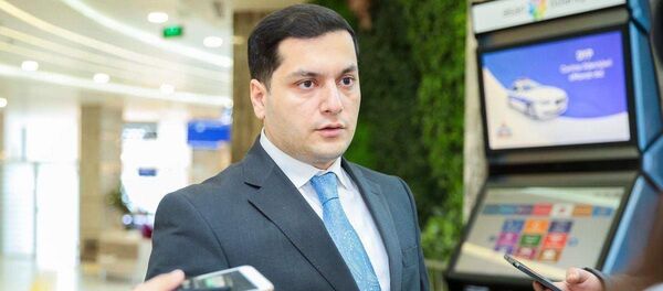 Пресс-секретарь ASAN Xidmət Эльнур Нифталиев, фото из архива Пресс-секретарь ASAN Xidmət Эльнур Нифталиев, фото из архива - Sputnik Азербайджан