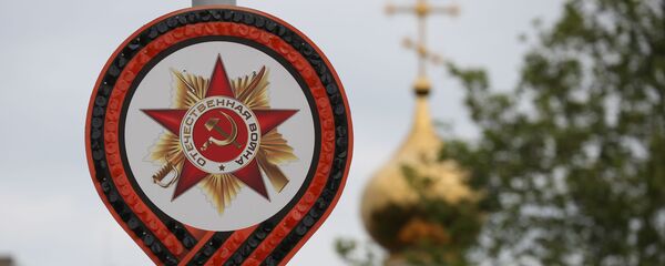 Баннер, посвященный 75-летию победы в Великой Отечественной войне, на улице в Краснодаре Баннер, посвященный 75-летию победы в Великой Отечественной войне, на улице в Краснодаре - Sputnik Азербайджан
