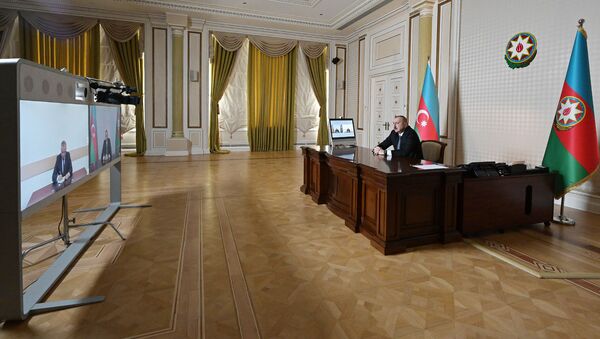 Президент Ильхам Алиев принял Азера Годжаева в формате видеосвязи  - Sputnik Азербайджан