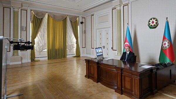 Алиев обсудил с Додоном борьбу с пандемией и перспективы сотрудничества Алиев обсудил с Додоном борьбу с пандемией и перспективы сотрудничества - Sputnik Азербайджан