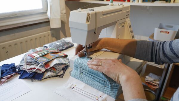 Сотрудница швейного дома, фото из архива - Sputnik Азербайджан