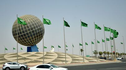 Флаги Саудовской Аравии на одной из улиц города Джидда