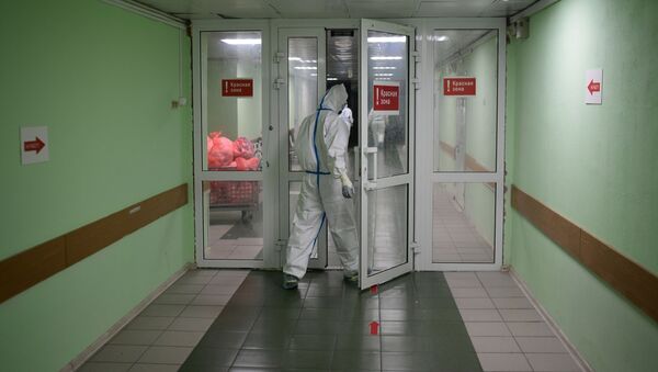 Медицинские работники в госпитале COVID-19 в ГКБ №15 имени О. М. Филатова - Sputnik Азербайджан
