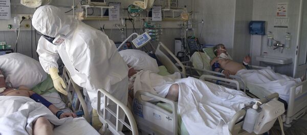 Медицинские работники в госпитале COVID-19 № 122 им. Л. Г. Соколова Медицинские работники в госпитале COVID-19 № 122 им. Л. Г. Соколова - Sputnik Азербайджан
