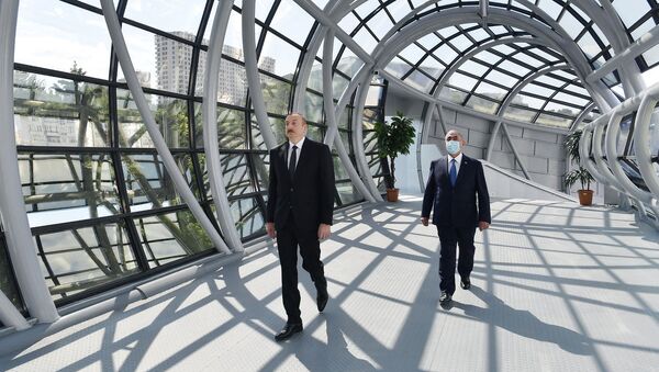 Президент Азербайджанской Республики Ильхам Алиев в Хатаинском районе  - Sputnik Азербайджан