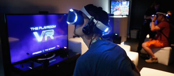 Игрок в PS4, фото з архива - Sputnik Азербайджан