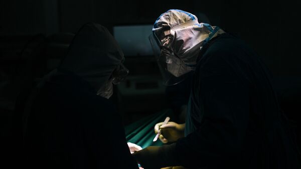 Медицинские работники в госпитале COVID-19 в ГКБ №15 имени О. М. Филатова, фото из архива  - Sputnik Азербайджан